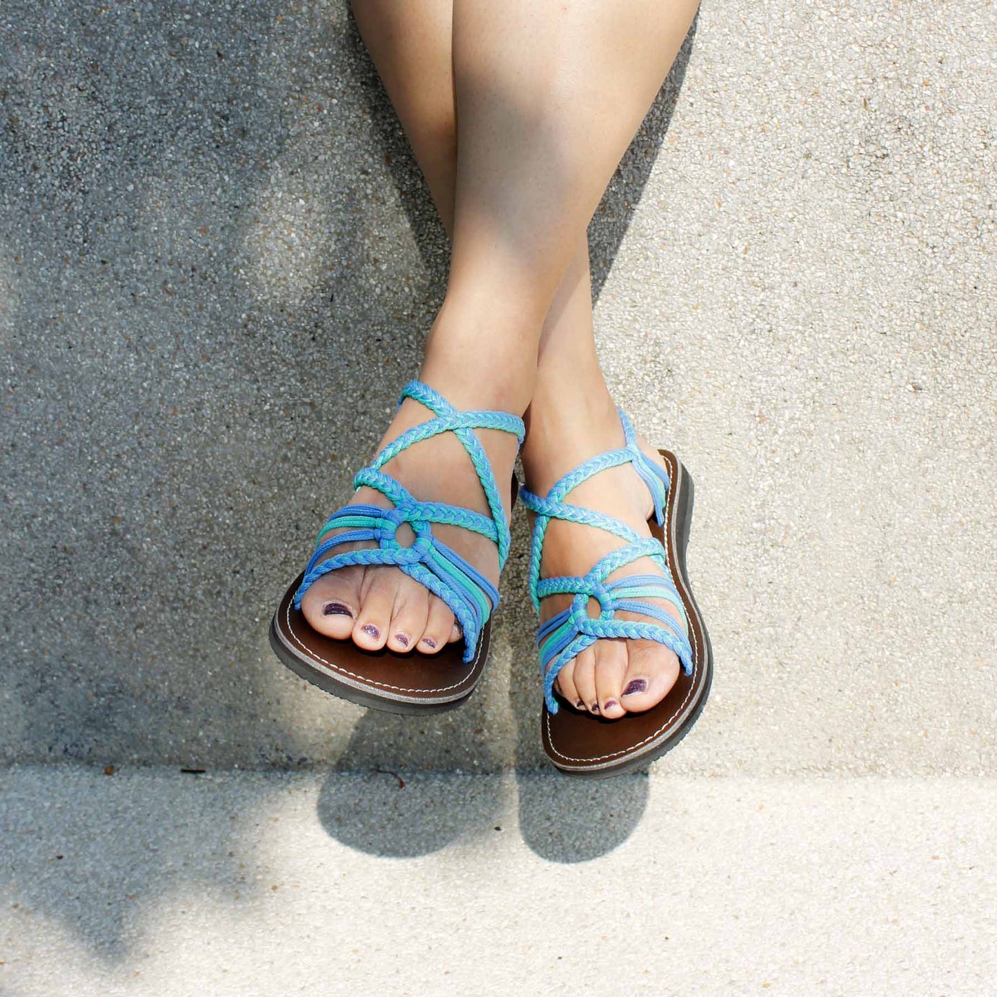 Capana brand wider design Turquoise Sky Blue Hand-Woven Rope Sandals on model