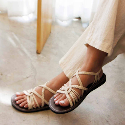Capana brand wider design Natural Hand-Woven Rope Sandals on model walking
