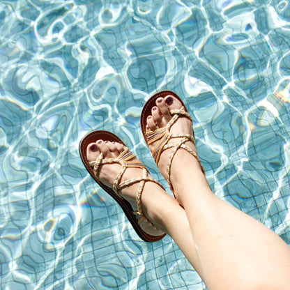 Capana brand Sahara Hand-Woven Criss Cross Rope Sandals on model at the pool