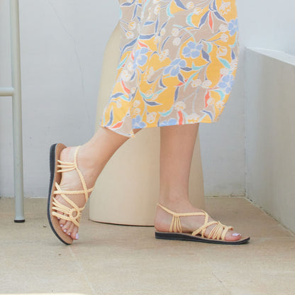Capana brand wider design Cream Cork Hand-Woven Rope Sandals on model walking