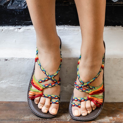 Capana brand loop design Festive Wavy Hand-Woven Rope Sandals on model