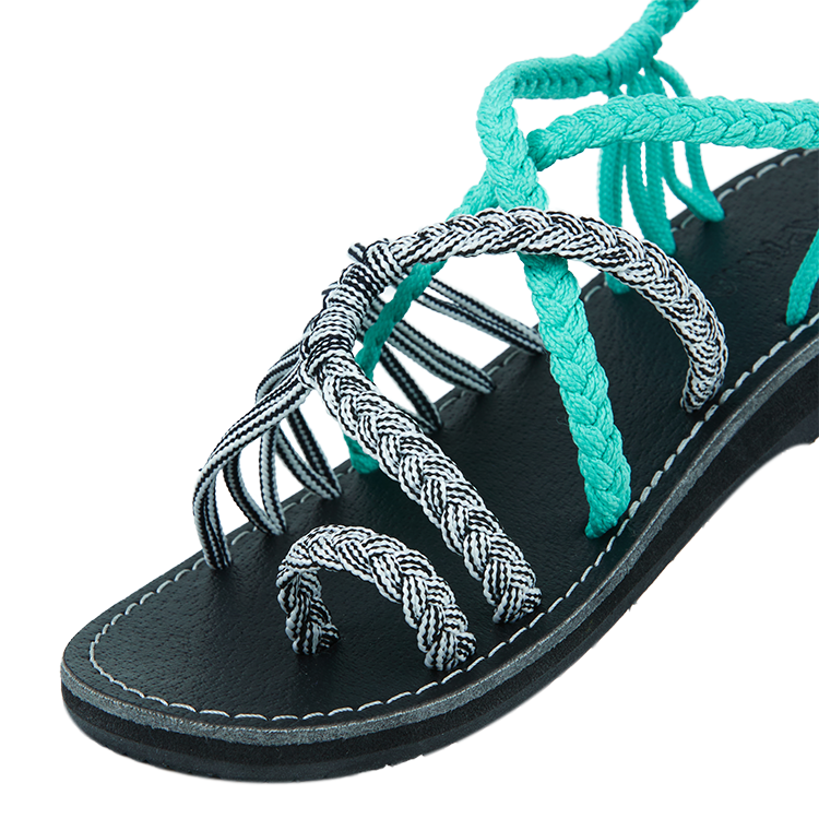 Hand woven sandals Turquoise Zebra Rope Sandals on the side close up in white background